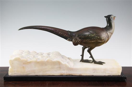 A French Art Deco patinated bronze model of a pheasant, 22.5in.